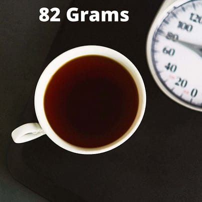 A cup of coffee, ground or whole bean, weighs around 82 grams.